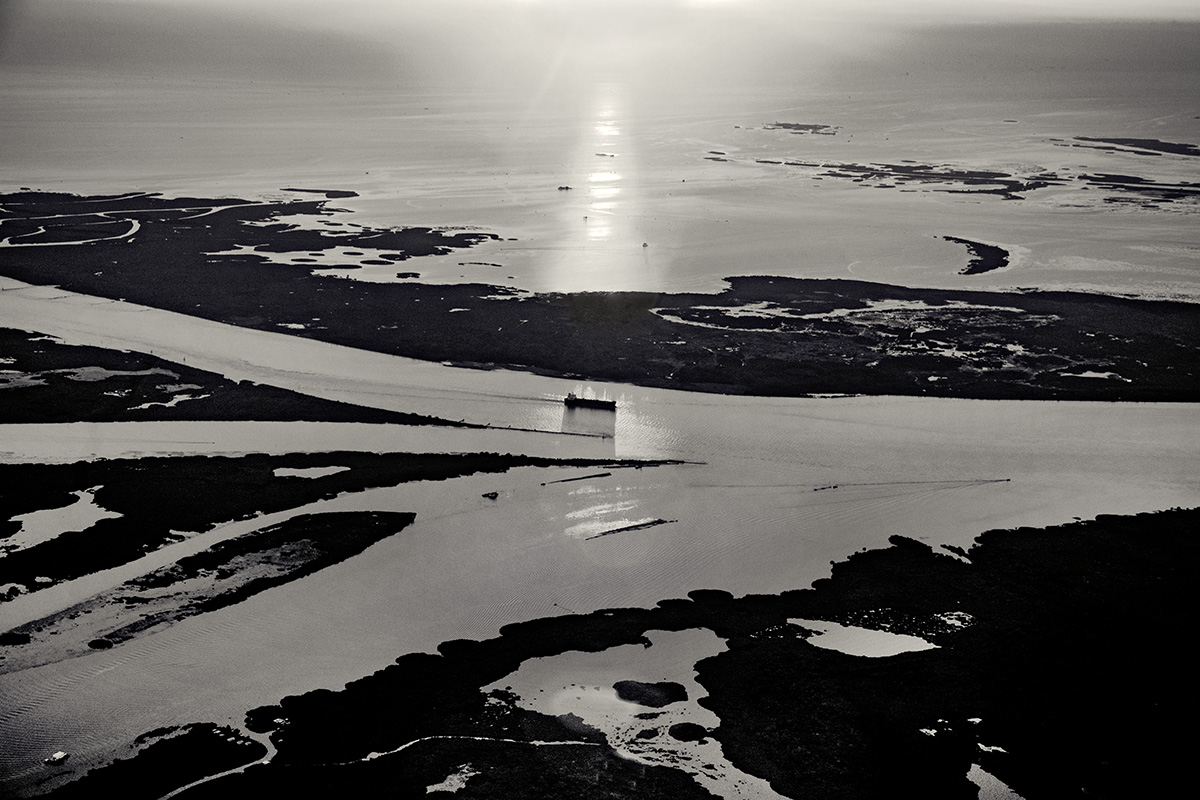 A tanker heads upriver at Head of Passes, south of Pilottown, LA. 